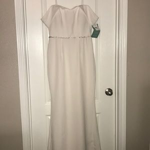 White off the shoulder dress. W/ attached belt.